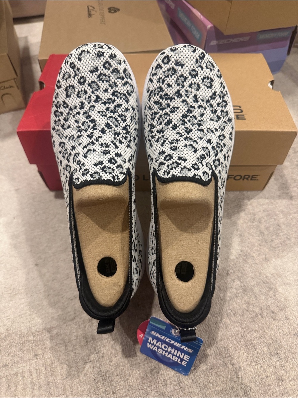 Skechers Black & White Slip-On Knit Sneakers
